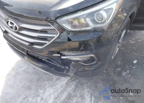 2017 Hyundai Santa Fe Sport 2.4L z USA, uszkodzony, nr VIN 5XYZUDLB8HG390934